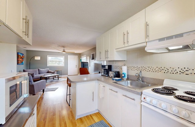 Coastal retreat w/ocean view and breezes, balcony, WiFi, AC, steps to the beach