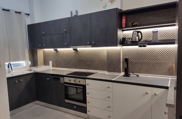 "Comfort Cave: Modern Living Near Metro & Thessaloniki Center!"