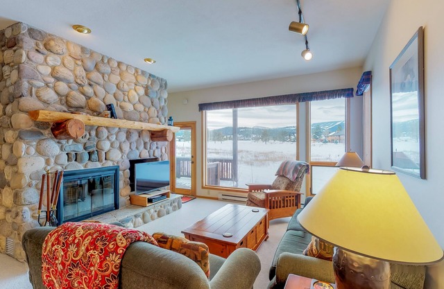 Condo with WiFi, fireplace, hot tub, & swimming pool