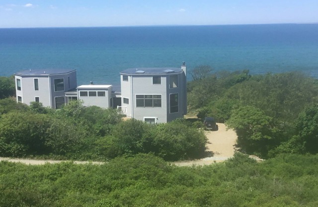 Contemporary beach house on dune directly on Cape Cod Bay