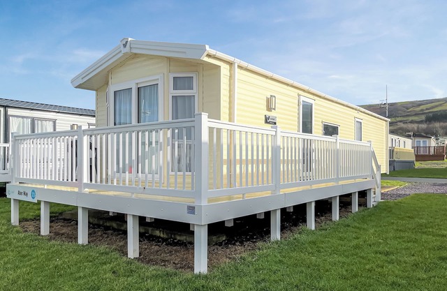 Contemporary caravan with one double and one twin.