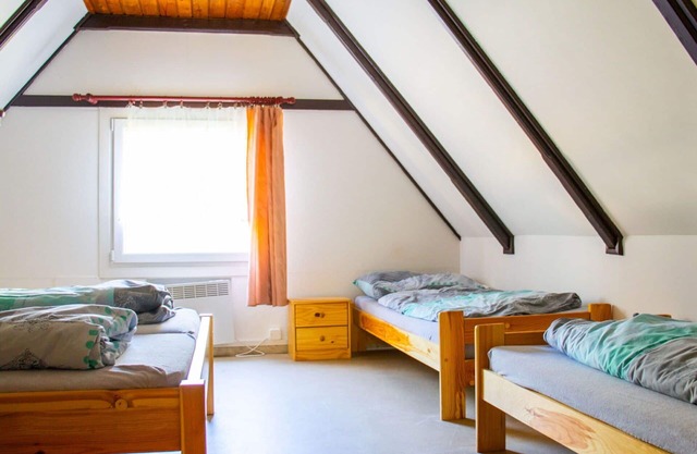 Cosy apartment in villa for 12 people with WIFI, TV, patio, pets allowed and parking
