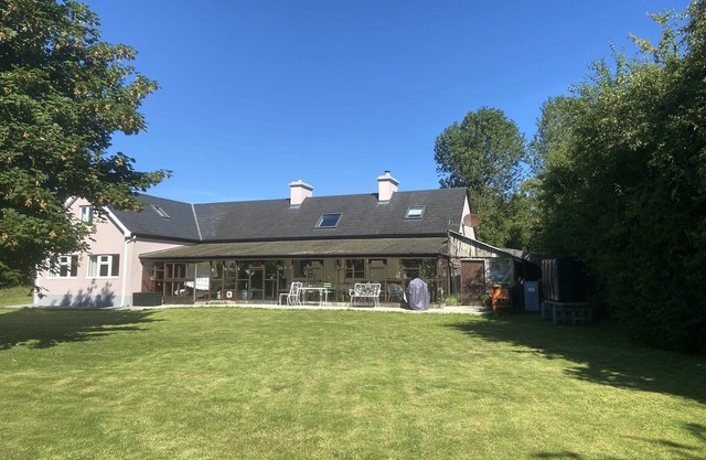 Cottage in a rural setting with large conservatory.