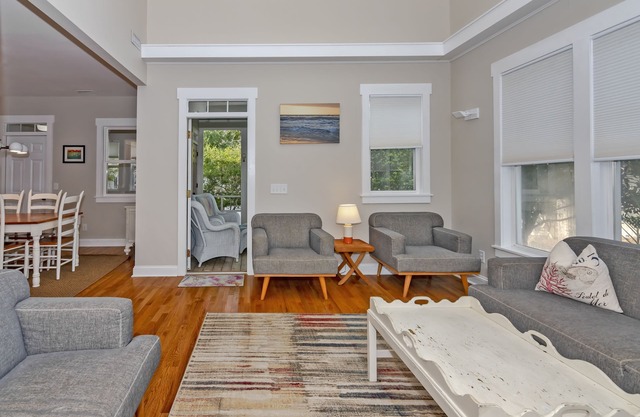 Cottage located in the middle of the island and amenities. Screened in porch and open concept living