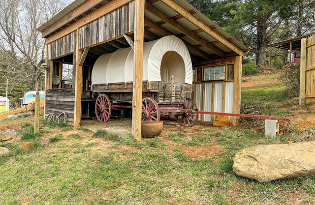 Covered Wagon Overlooking Pond