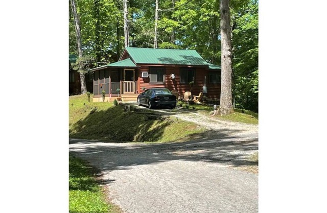 Cozy cabin tucked away in rustic Bryson City, NC mountain resort. Watch video.