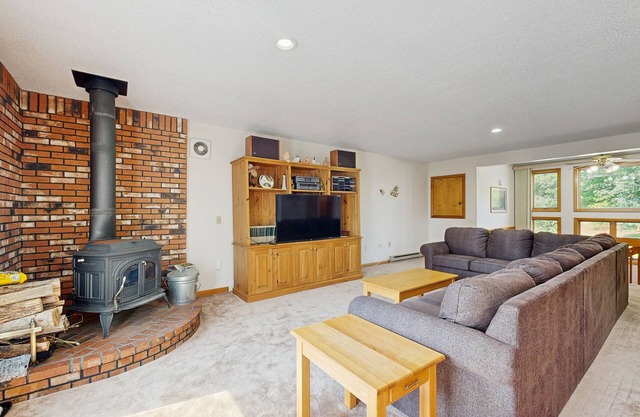 Cozy Condo with Shared Pool, High-Speed WiFi, W/D, Partial AC, & Wood Stove