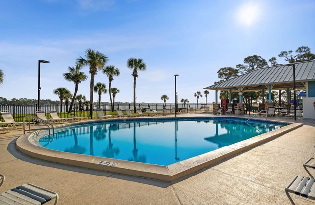 Cozy family vacation in Panama City Beach with golf cart ,private beach, pools