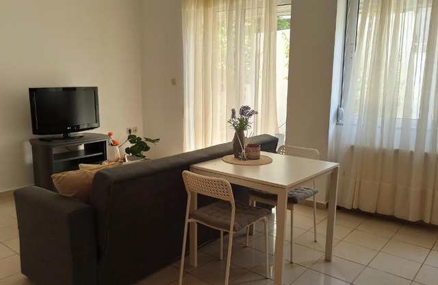 Cozy flat close to the Airport/Port and Center