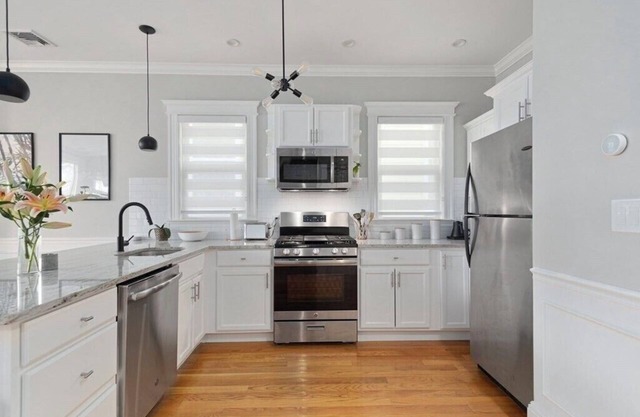 Cozy Southie Condo with Fireplace and Private Roof Deck