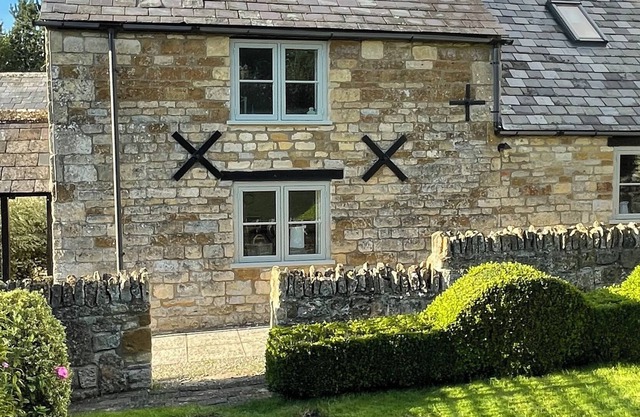 Delightful Grade II listed stone cottage in a lovely Cotswold setting.