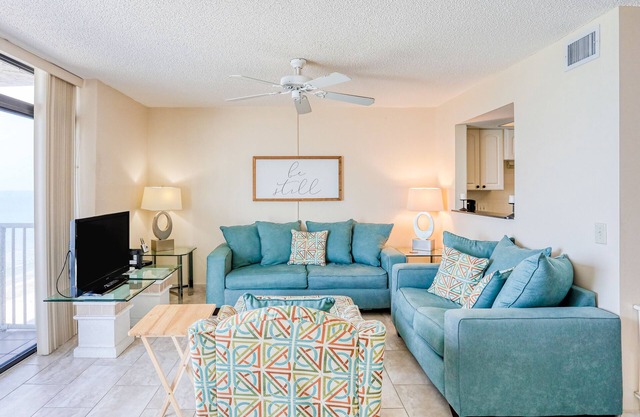 Delightful waterfront condo with sweeping views, beach access, balcony & pool