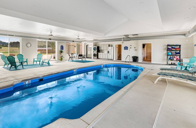 Deluxe spacious home w/private indoor pool, 2 hot tubs, game room, fireplaces