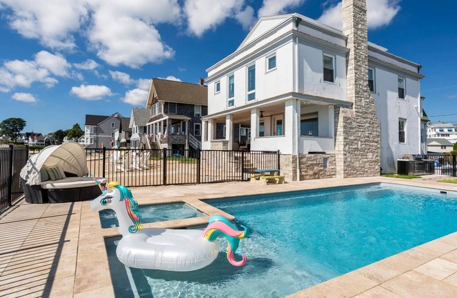 Direct Beach Water Front with Heated Pool