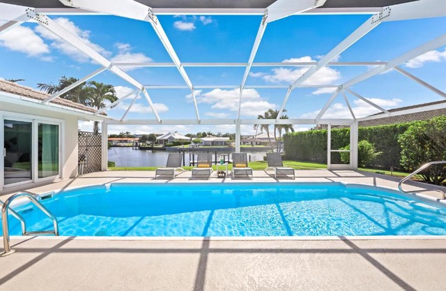 Direct boating access home in Olde Marco with pool