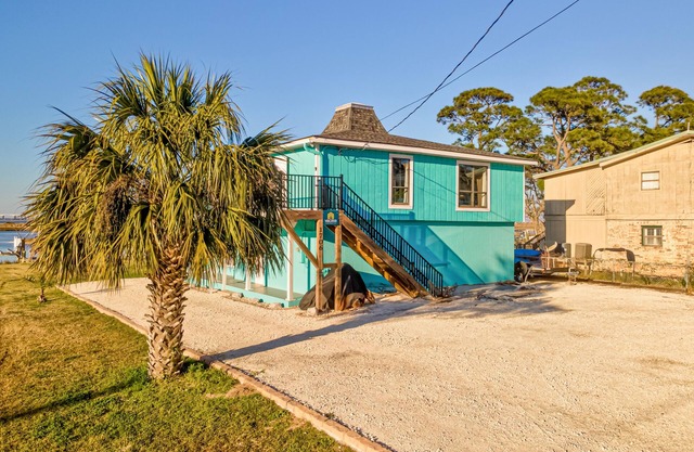 Dog-friendly bayfront duplex with private dock, 2 boat slips, kayaks, bay views
