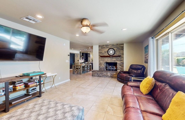 Dog-friendly home with private pool, hot tub, W/D, central AC & enclosed yard