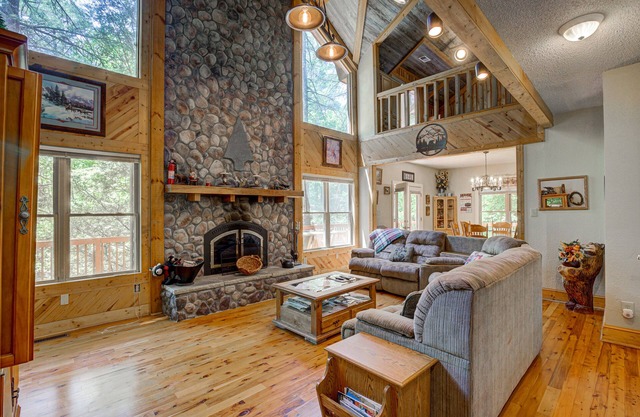 Dog-friendly riverfront cabin with waterfall view, large decks, firepit, Ping-Pong