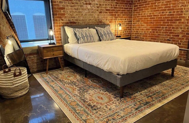 Downtown 2BR w/exposed brick charm