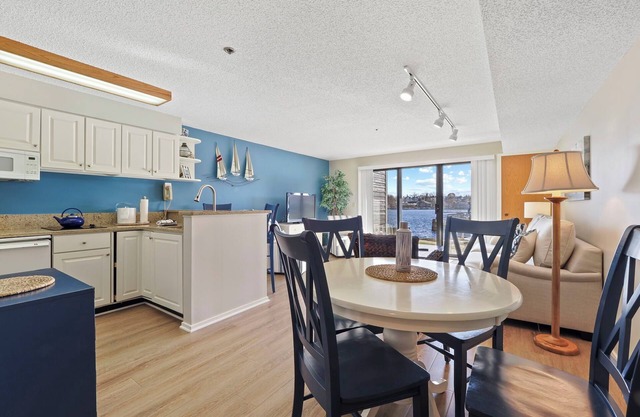Edgewater Inn Condo with Waterfront Access | Pool, Hot Tub, Sauna | Sleeps 4