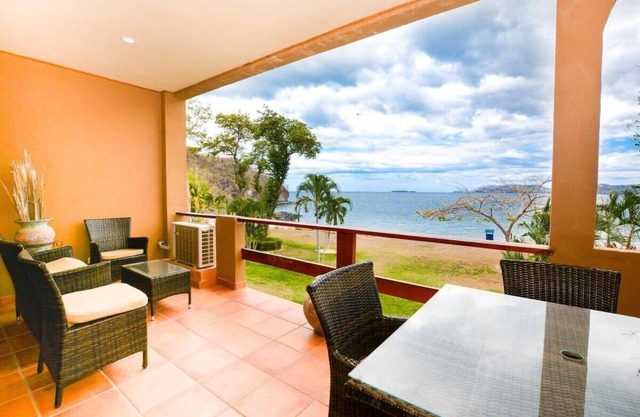 Elegant 3BR Beachfront Condo with Spacious Interior, Ocean-View Terrace & Direct