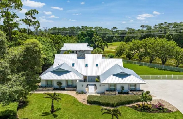 Elegant 4 Bedroom Pool home with pond