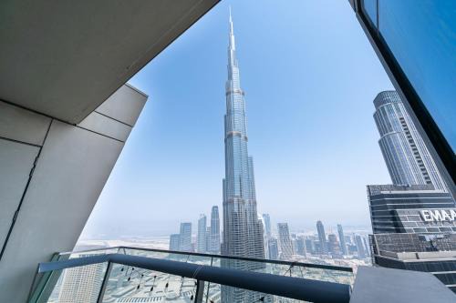 Elegant 4BR High-Rise Overlooking Burj Khalifa & Fountains