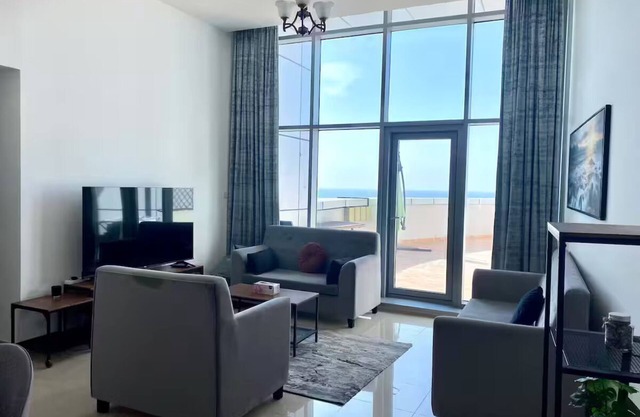 Elegant Beachfront Apartment with Sea Views