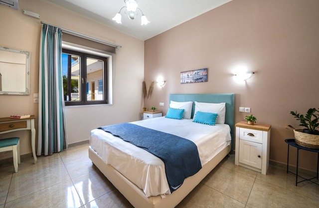 Elegant, bright residense w/ ample garden, steps from sandy beach & Chania town