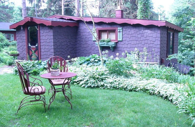 Enchanted Lakeside Cottage Nestled in Perennial Gardens