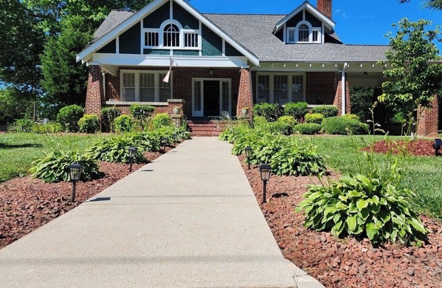 Enjoy small-town, Main Street from the front porch of this historic bungalow!