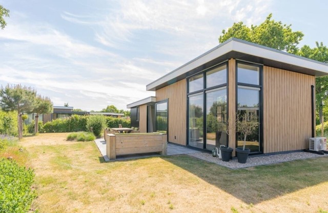 Enjoy the outdoors in this luxury chalet at Duinvilla’s Schouwenduin with a large sliding door, high