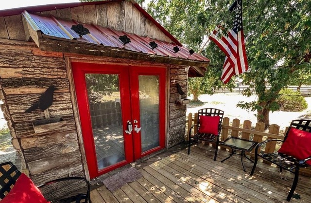 Escape to The Bird's Nest, a charming tiny home nestled on a sprawling 62-acre farm