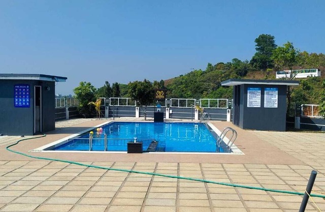 Escape to Vagamon Bliss: Luxury Pool Resort Amidst Nature's Serenity