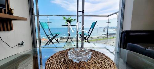 Exclusivos Departamentos. Vista al mar, cocina, lavadora, terraza, wifi, TV Smart, toallas y parking.