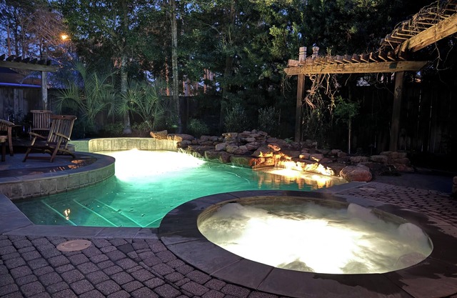 Expansive 4-Bedroom Luxury Getaway Featuring Pool and Hot Tub in North Houston.