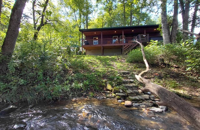 Experience the charm of Bryson City in this cozy 2-bedroom cabin, Creekside Too.