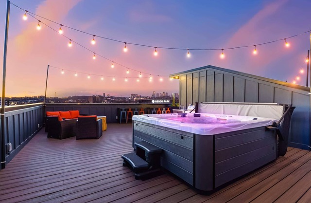 Fall rooftop decks, hot tubs, game zones near Broadway and Geodis Park