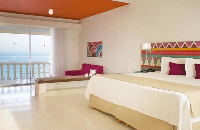Family-friendly Cancun Royal Junior Suite with Ocean View Balcony and Water Park