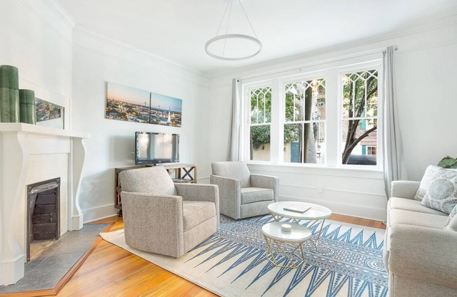 First Floor Condo w/Large Living Area in Historic Dist. by Lucky Savannah