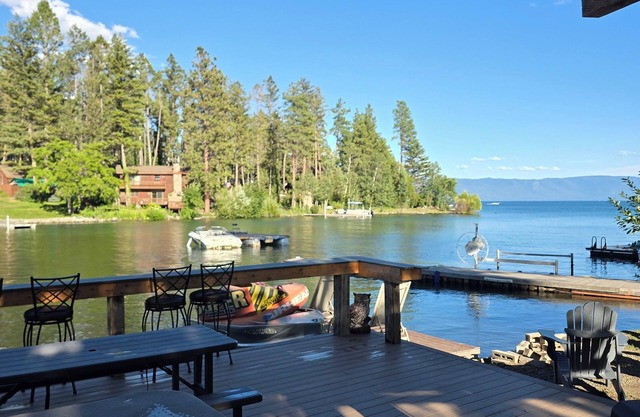 Flathead Lake home W/private beach, dock, and hot tub