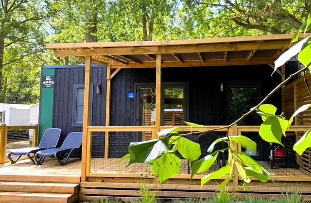 Flower Camping Les Dunes * - Homeflower Premium CLIM 26.5m2 (2 bedrooms) + semi-covered terrace + TV + sheets + towels 4 people