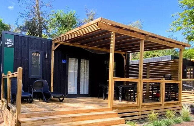 Flower Camping Les Dunes * - Homeflower Premium CLIM 30.5m2 (3 bedrooms) + semi-covered terrace + TV + sheets + towels 6 people