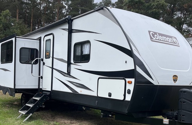 Foley, Alabama RV with lot in small park, close to gulf beaches and amenities.