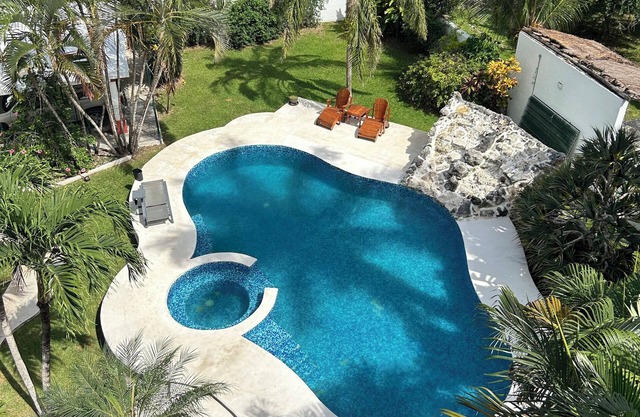 Four Bedrooms and large private pool steps from Paradise Beach