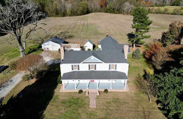 Freshly renovated c1900 Farmhouse in Plainview surrounded by crop fields
