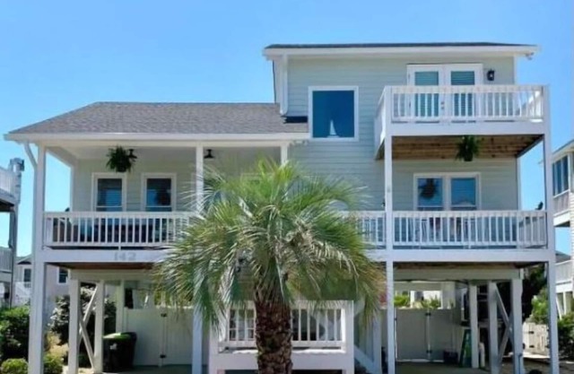 FULLY RENOVATED: pool, walk to beach, water views!
