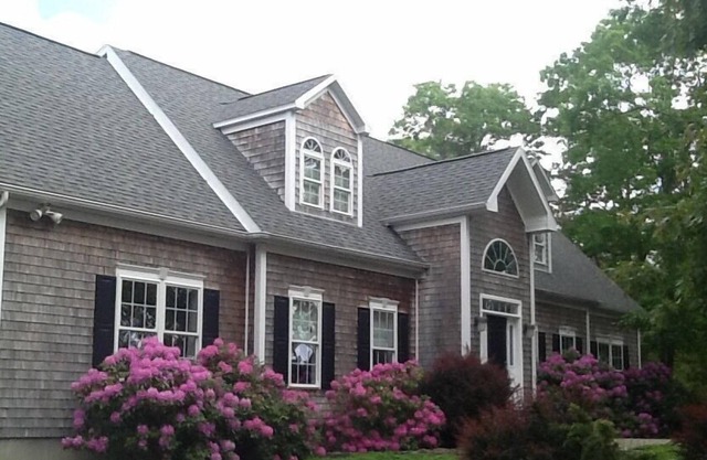 Fully Updated East Quogue 5BR home with Heated Pool on acre with large deck