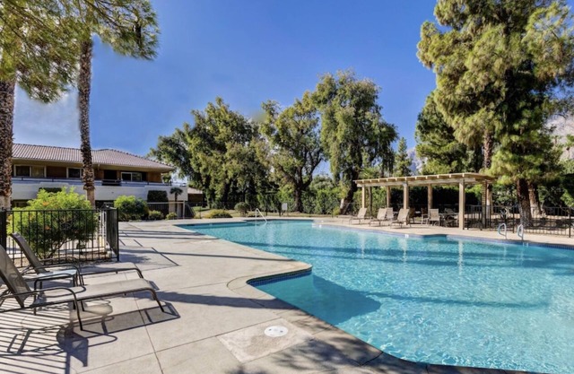 Furnished, comfortable Mid-Mod unit with Pool. Quiet, all utilities included!