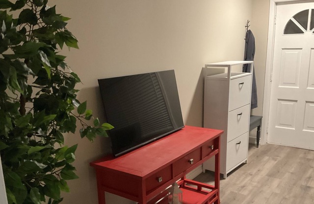 Furnished inclusive 1 bed + large den parking laundry patio suitcase ready